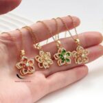 Pink Rotating Bauhinia Zircon Flower Pendant Necklace - Alloy and Zircon - 15mm Pendant, 40+5cm Chain, Design for Women, Fashionable Collarbone Jewelry Gift - Image 3